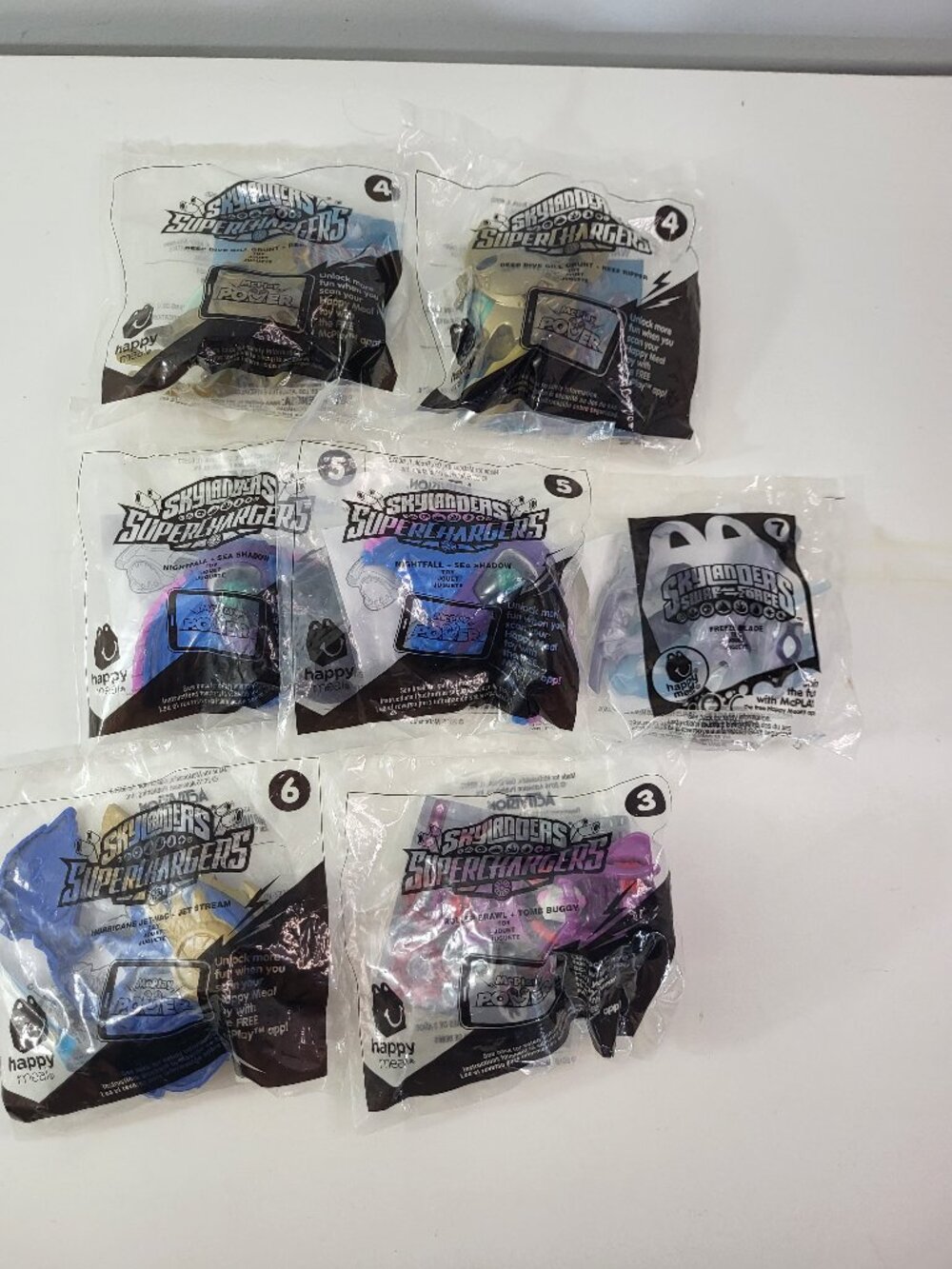 Lot of 7 Sealed McDonald’s Happy Meal Skylanders SuperChargers & Swap Force Toys
